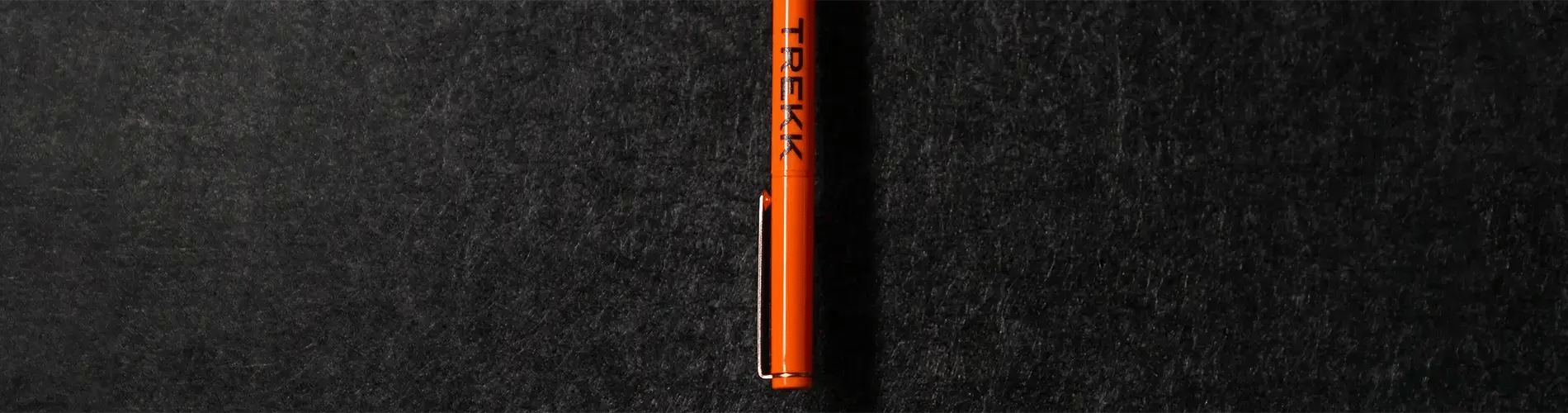 Trekk pen on black background 
