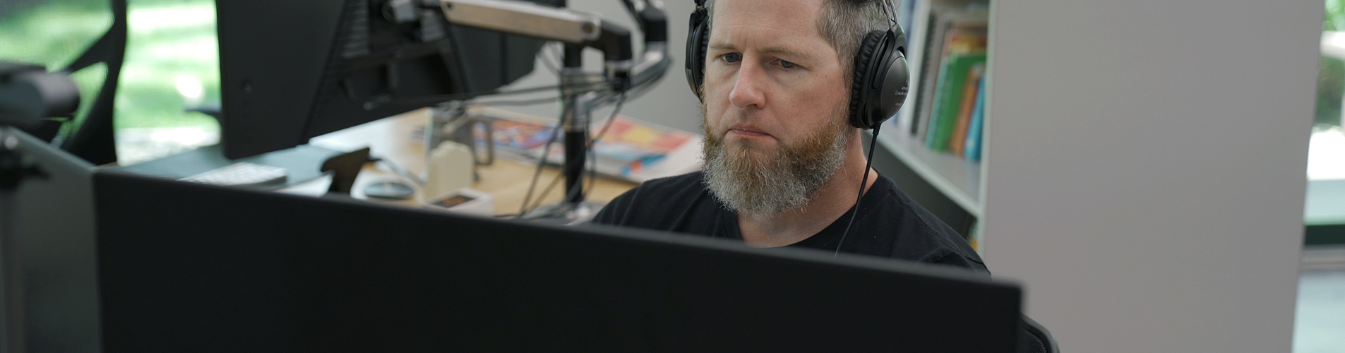 Nick works on a video project at Trekk