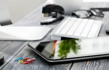 mobile device and keyboard on a desk