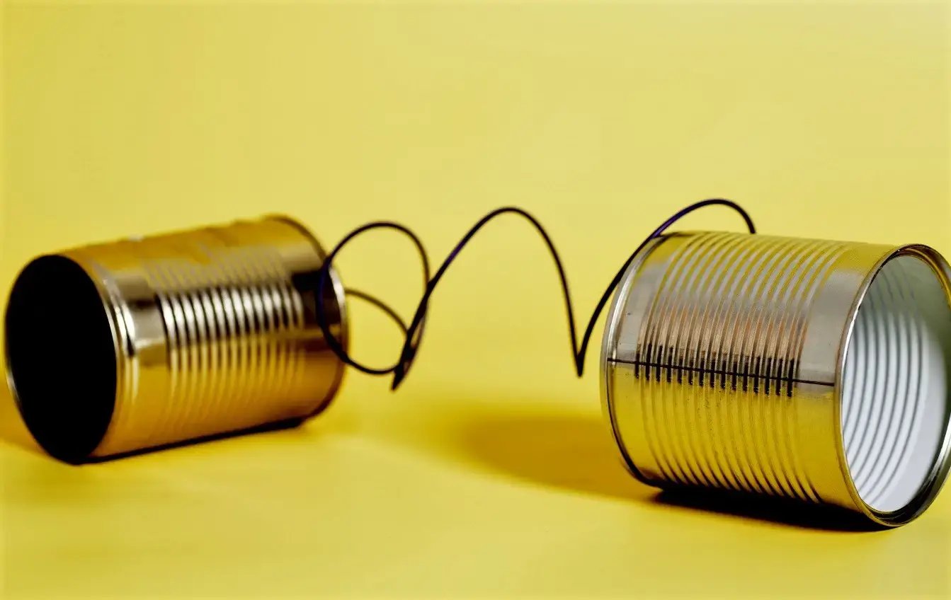 Two cans connect by a wire