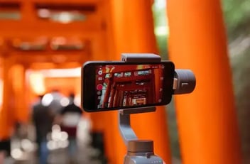 A phone on a tripod recording a video