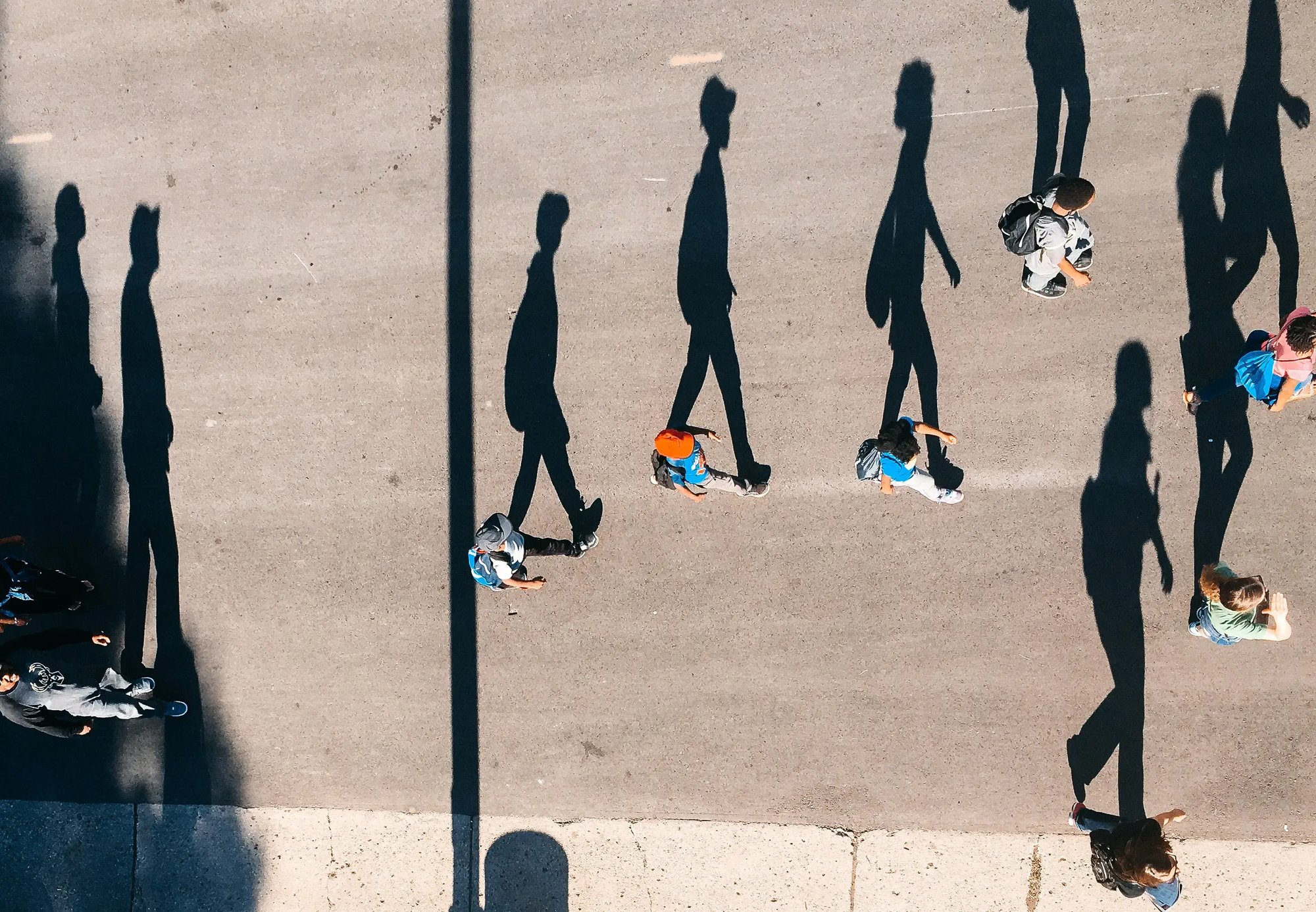 People walking on a sidewalk