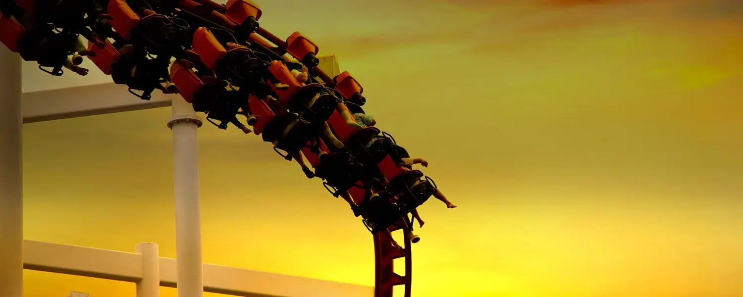 People on a rollercoaster