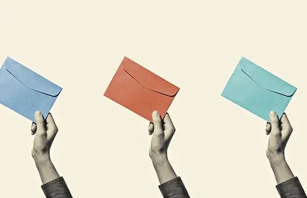 Three hands each holding an envelope