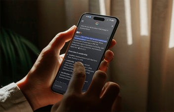 A phone displays a Google AI search of Trekk