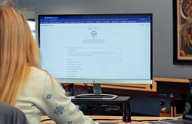 Woman working on desktop computer 