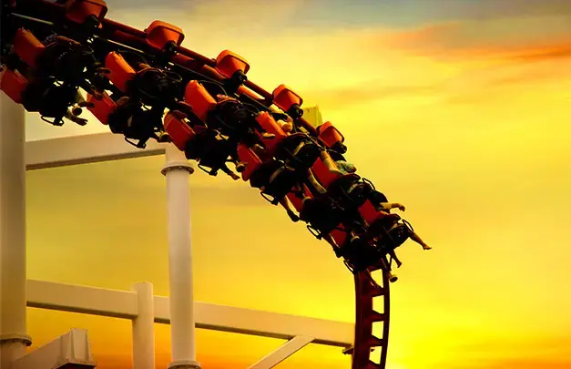 People on a rollercoaster